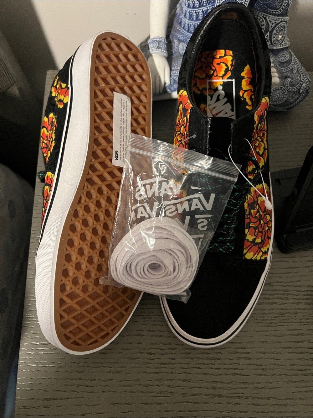 Vans Kids Black Slip-On Sneakers with Yellow and Orange Floral Print